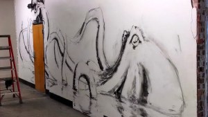 Quickly laying out the design in charcoal.